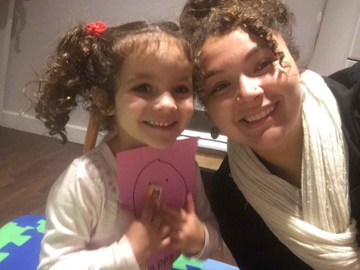 Native English teacher with young student